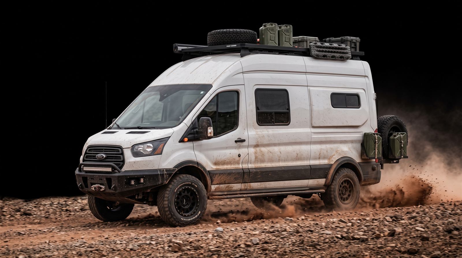 Transit 4x4 Camper kicking up dust on a desert track
